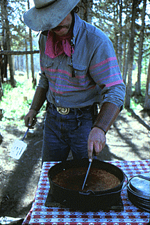 Alex Reynoso checks cornbread.